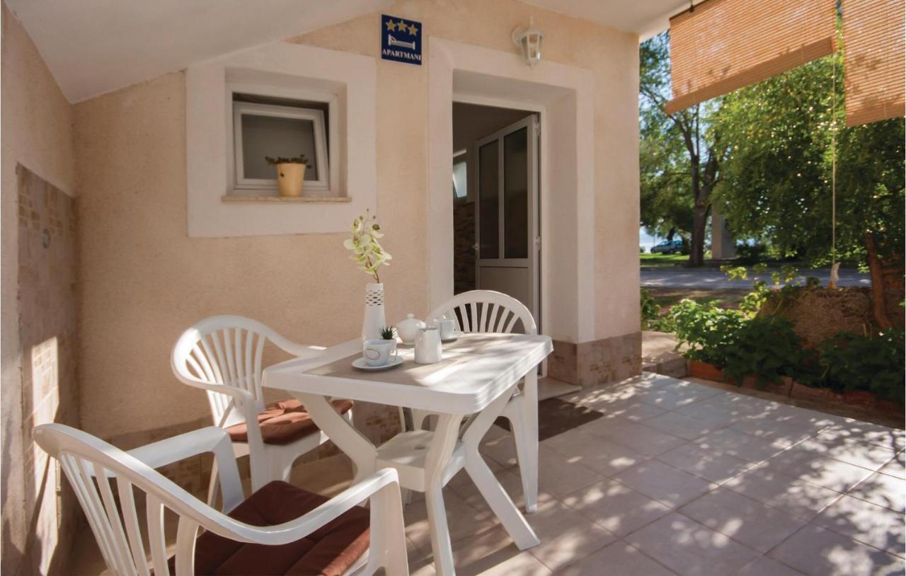 Nice Apartment In Raslina With House Sea View Екстер'єр фото
