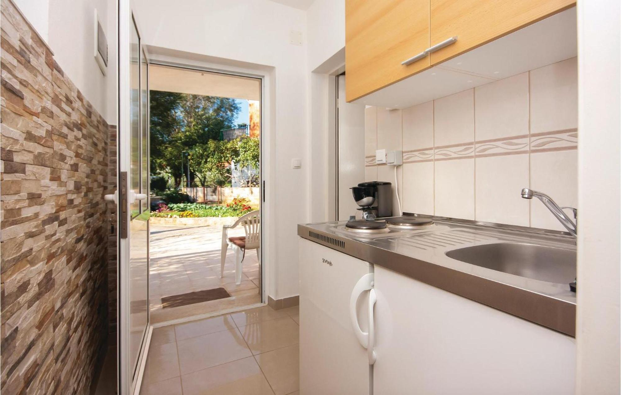 Nice Apartment In Raslina With House Sea View Екстер'єр фото